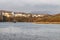 Boat in Clifden bay with village in background