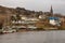 Boat in Clifden bay with village in background