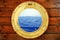 Boat closed porthole with vacation seascape view