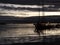 Boat and cloud reflection on water