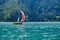 Boat with colorful sails at Achen Lake Achensee, Tirol, Austria, with turquoise waters