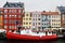 Boat and colourful old houses at Nyhavn harbour, Copenhagen