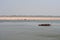 Boat Crossing the Ganges River in Varanasi, India