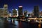 A boat cruises the Intercoastal Waterway  Miami Skyline