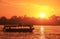 Boat cruising the Nile river at sunset, Luxor