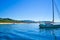 Boat diving in front of a beach of Cies Islands, in Galicia, Spa