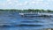 Boat dock with benches on a lake with white waves in Bemidji, Minnesota.