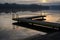 Boat dock on a calm sunrise morning on the river