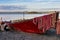 Boat docked on Marta beach, a little medieval village on Bolsena lakeshore, Viterbo province, Lazio, Italy