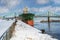 Boat docking at a quay in Old Port of Montreal before the Jacque Cartier bridge