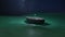 Boat drifting in the sea at night