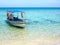 Boat Floating on Turquoise Colored Water