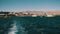 Boat is Floating on the Waves and Leaves a Trail in the Red Sea