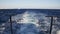 Boat is Floating on the Waves and Leaves a Trail in the Red Sea