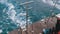 Boat is floating on the waves and leaves a trail in the red sea. Stern of the ship. Egypt