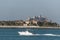 Boat in front of villas and Atlantis The Palm in Dubai