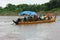 Boat with full passengers crossing the bengawan solo river