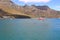 A boat full of tourists arriving at Hout Bay harbour