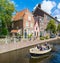 Boat on Groenhazengracht canal in Leiden, Netherlands