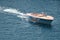 a boat with guests of yacht brokers departs from the shore in the largest fair exhibition in the world yacht show MYS