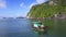 Boat with Guy Girl Passes by Drone against Boundless Ocean