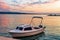 Boat in harbor in Adriatic Sea in Omis at sunset