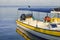 Boat and its reflection at the pier of the little Garifuna town of Livingston, the Caribbean sea, Guatemala