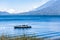 Boat on lake & 2 volcanoes, Lake Atitlan, Guatemala