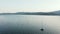 Boat in the lake - peaceful sunset aerial panorama