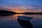 Boat in lake with sunset in Royal national park, NSW Australia