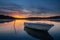 Boat in lake with sunset in Royal national park, NSW Australia