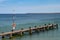 Boat landing stage with rescue ring and rescue pole