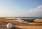 A boat and lanterns on the sand beach