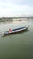 boat leaning on the sea with calm waves Bangkalan Madura