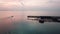 A boat leaving the jetty to sea at Jelutong