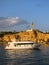 Boat and lighthouse at sunset