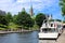Boat lined Rideau Canal and Parliament Hill, Ottawa, Ontario, Canada