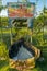 Boat made of coconut tree trunks, garden on an island in Coroa Vermelha, Bahia.