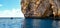 Boat on a malt cliff with white sand bottom and turquoise water