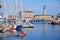 Boat marina and lighthouse in Trieste, Italy