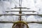 Boat mast with furled sails