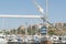Boat mast and winch in port