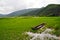 Boat on Meadow with Rich Water