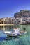 Boat Moored Outside the Beach of the Beautiful Fishing Village of Cefalu on Sicily, Italy