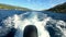 Boat in motion with foam wake behind the stern of fast moving motor boat