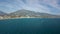 A boat navigating in from of marbella coast, malaga in the south of Spain, views of all shore in the picture of marbella town