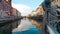 boat on naviglio in milan italy in sunny day