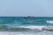 Boat near the Beach of Black Sea from Mamaia, Romania, blue clear water