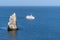 Boat in open blue sea. The black sea resort of Yalta