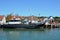 Boat organizing sea fishing trips moored in the port of Leba town. Poland